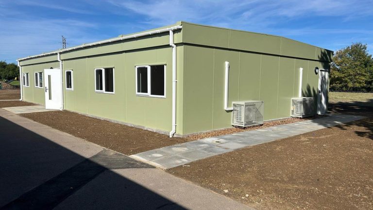 New green modular classroom block for Advantage Schools with new external footpaths