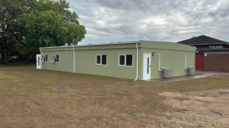 Completed modular classroom building for Advantage Schools set within the school grounds